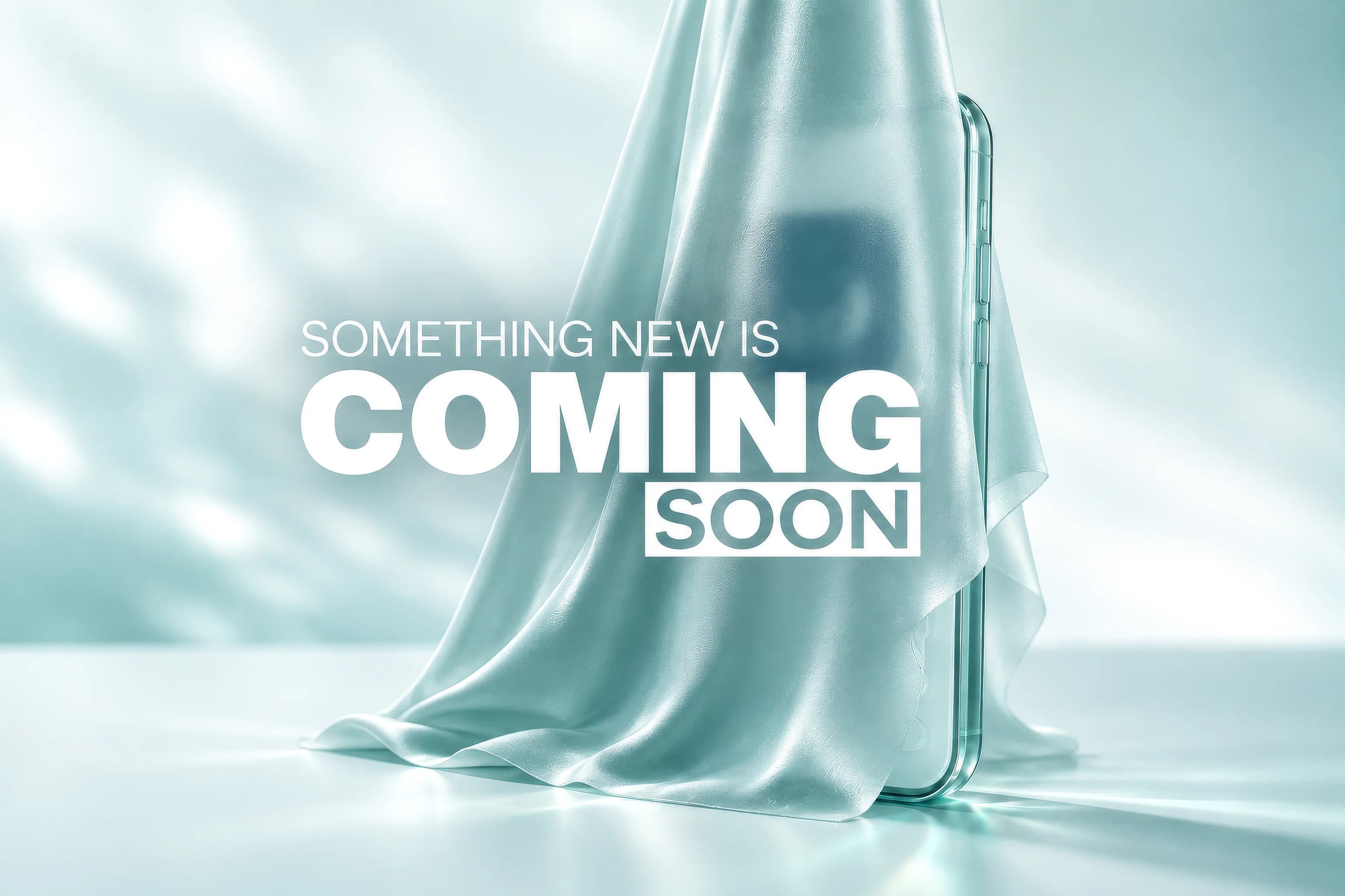 A smartphone concealed under draped silk, captioned “Something new is coming soon” — the device stays covered, so no real app interface or features are shown